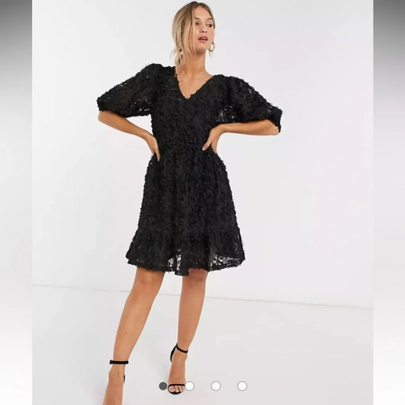 Vero Moda textured mini dress with puff sleeves in black - Picture 1 of 10